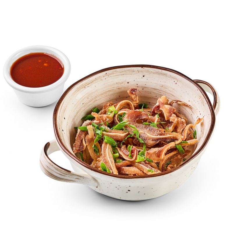 Свиные уши с соусом техас